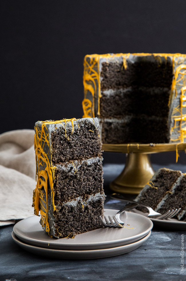 slice of Halloween Black Sesame Cake with marshmallow webs.