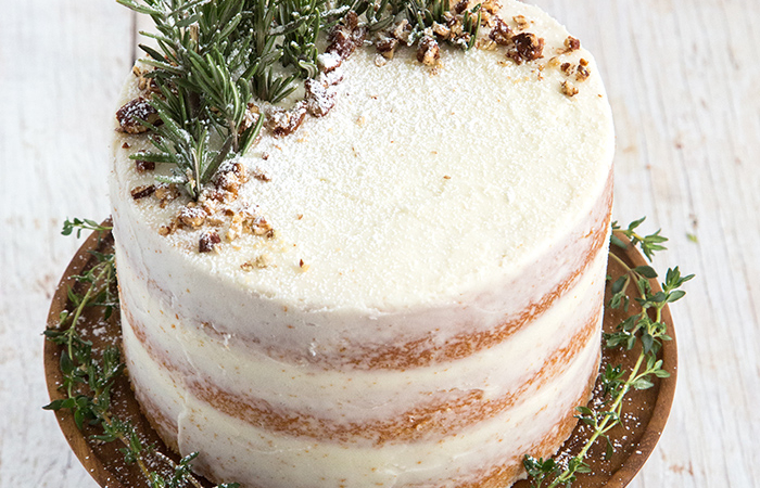 Rosemary Lemon Cake garnished with fresh rosemary