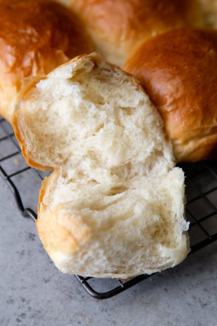 interior of soft and fluffy milk bread dinner rolls.