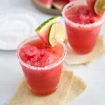 Watermelon Margarita Float garnished with watermelon wedge and lime slice.