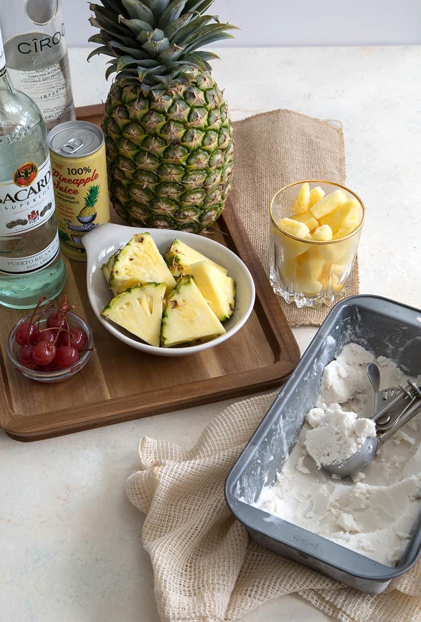 ingredients for frozen pina colada made with coconut ice cream. 