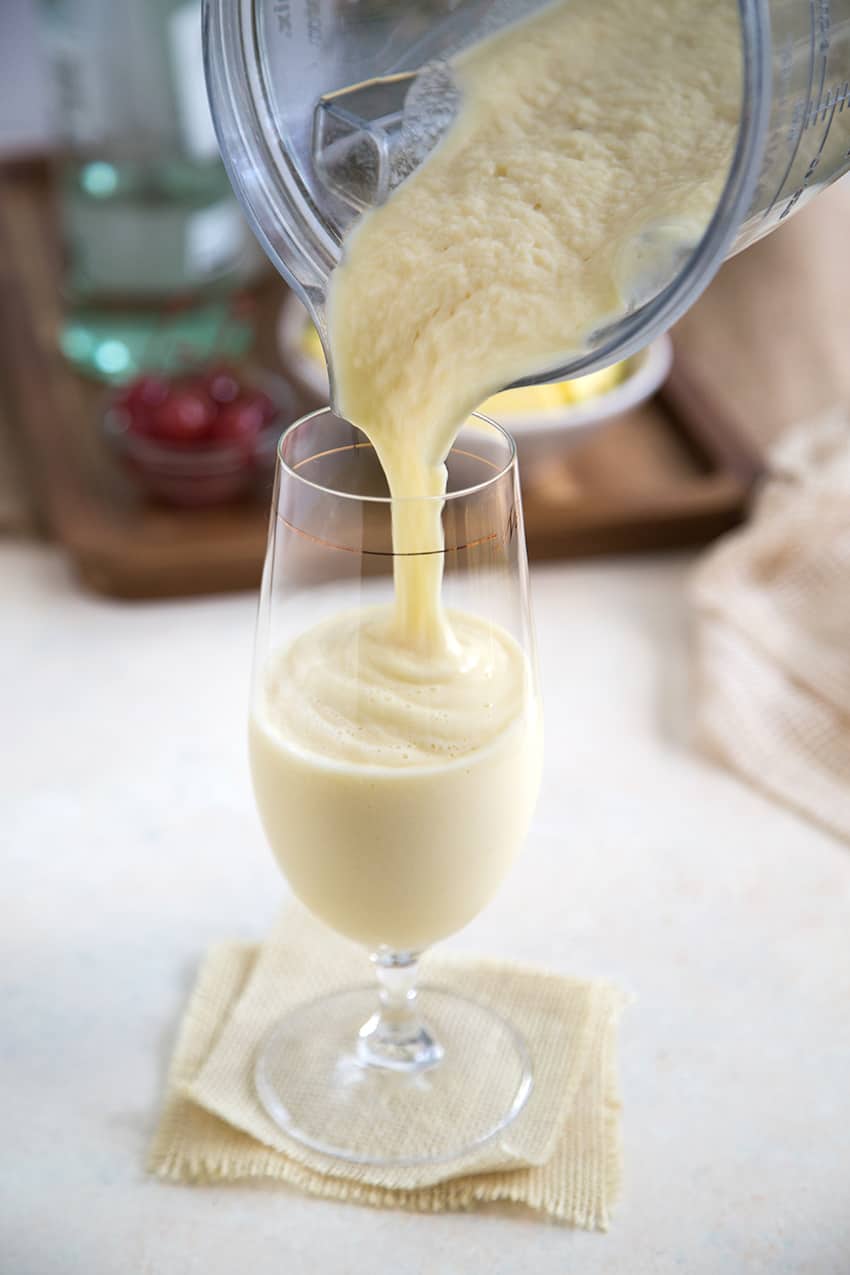 immediately pour blended drink into serving glass. 