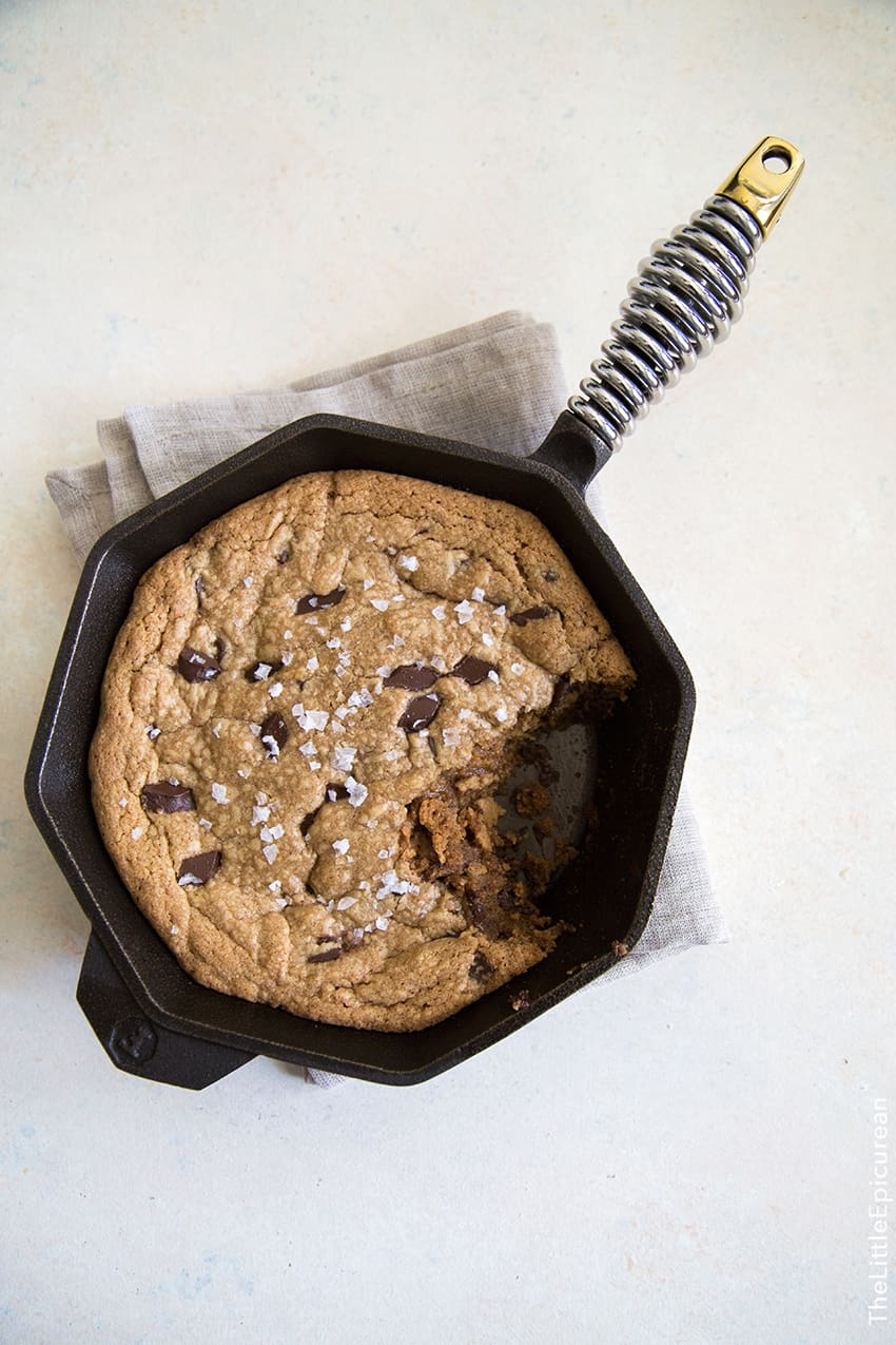 peanut butter chocolate chunk cookie cooked in a skillet. 