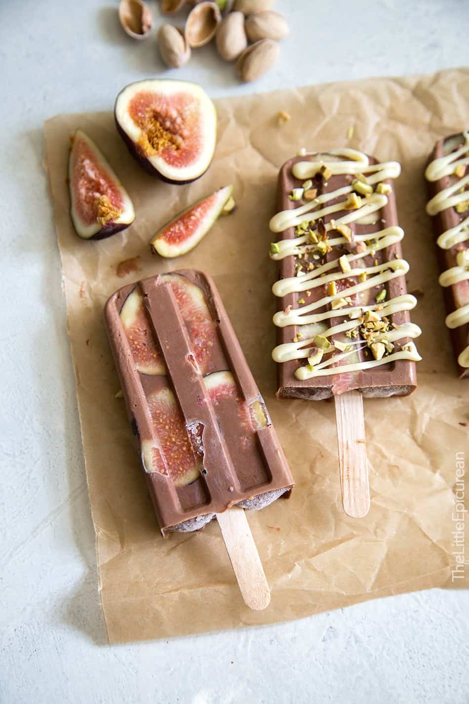 Fig Fudge Popsicles with White Chocolate Drizzle and Crushed Pistachios