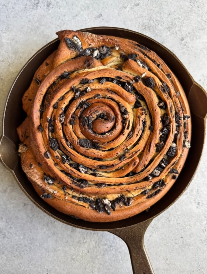 giant cookies and cream roll baked in cast iron pan