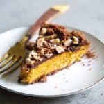 slice of Chocolate Hazelnut Pumpkin Pie on white plate.