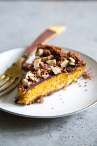 slice of Chocolate Hazelnut Pumpkin Pie on white plate.