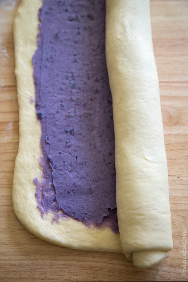 purple filling spread in yeast dough.