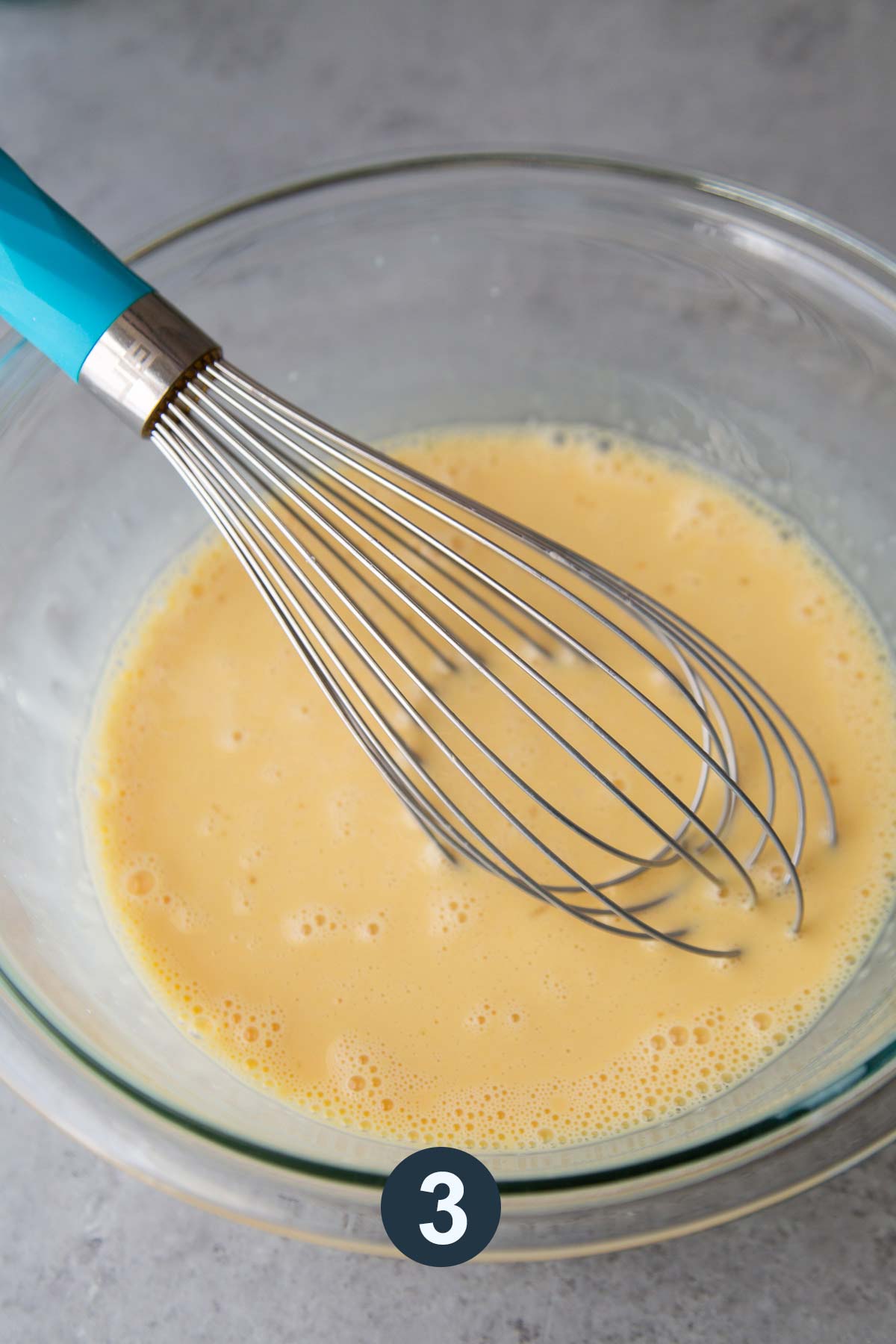 whisk together egg yolks, evaporated milk, and sweetened condensed milk in bowl.