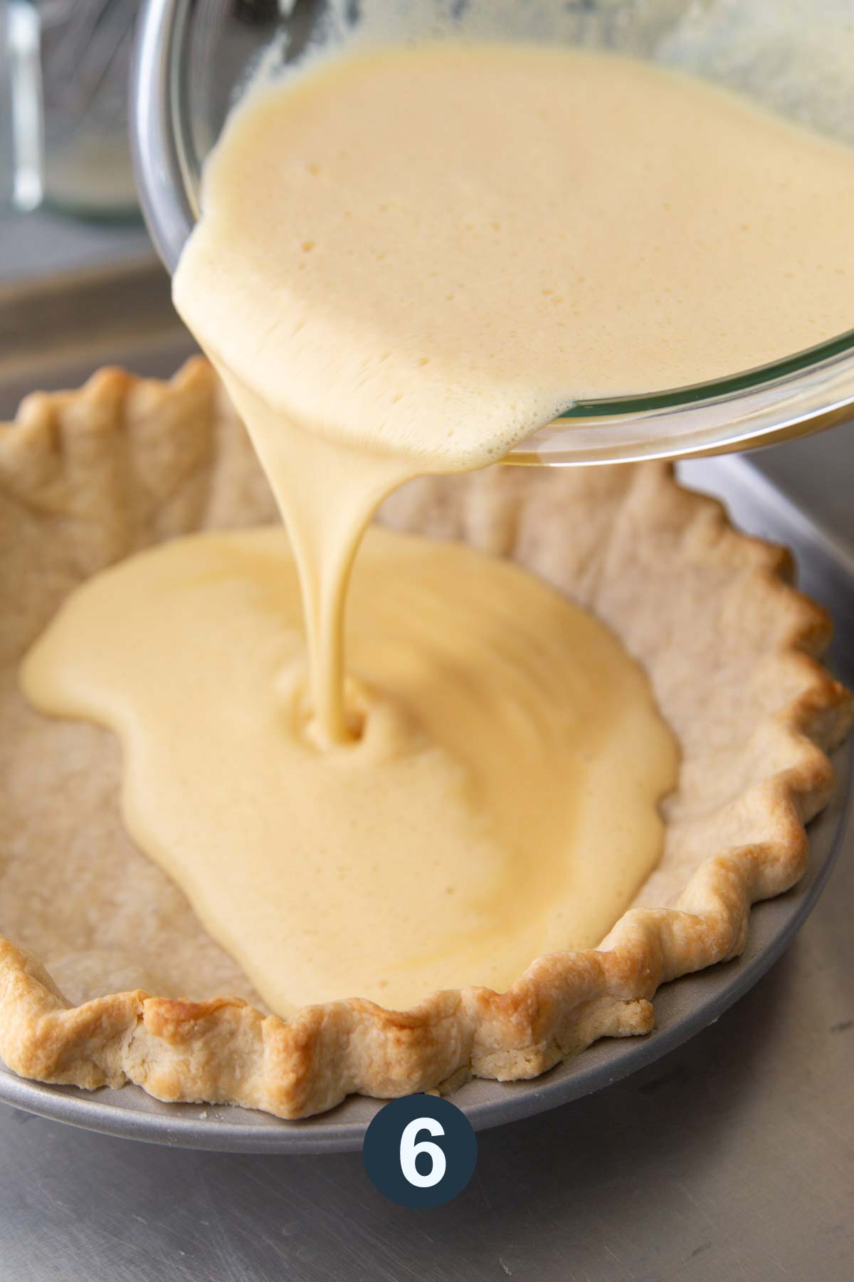 pour custard filling into par-baked pie shell.