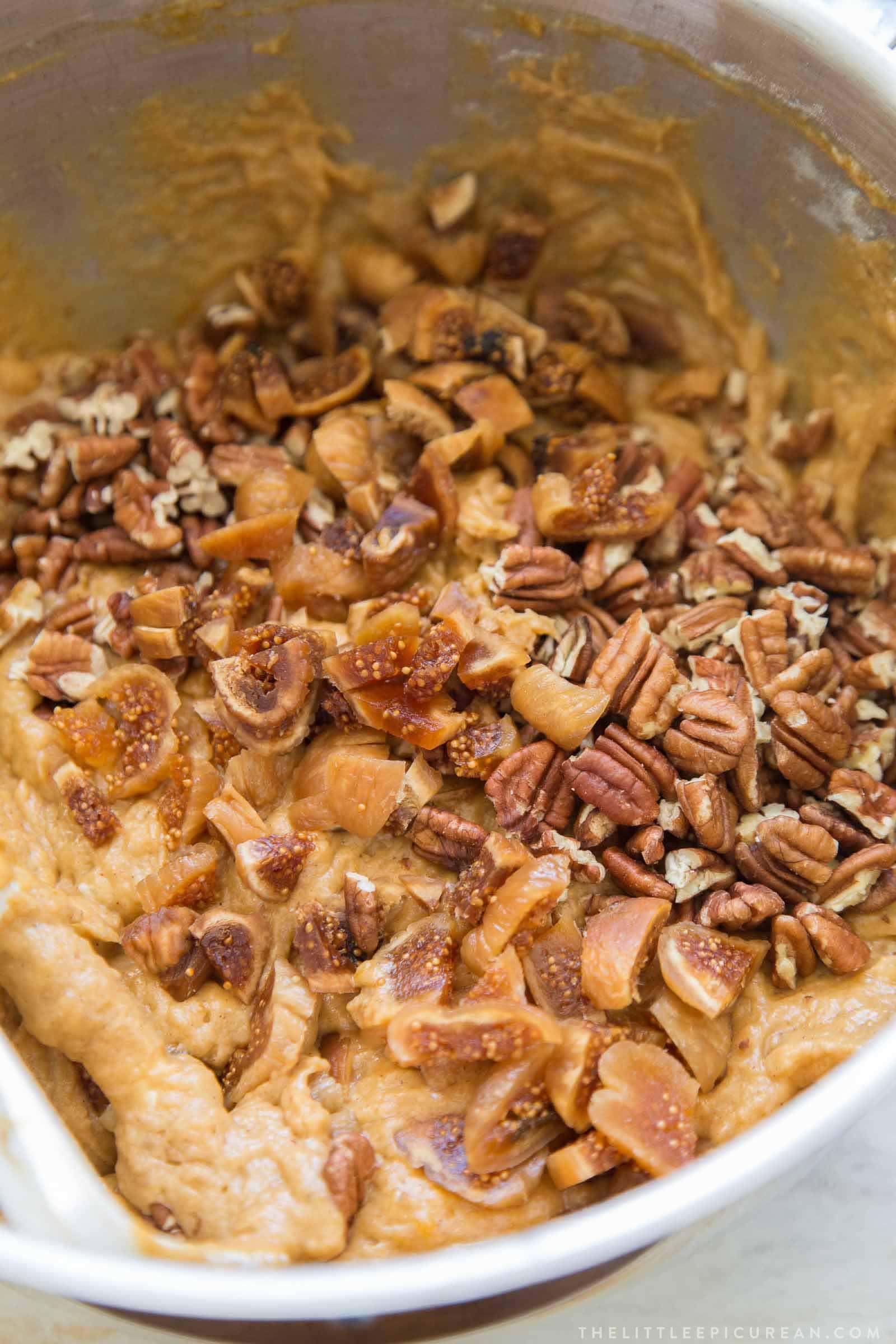 banana pumpkin bread batter with chopped figs and pecans. 