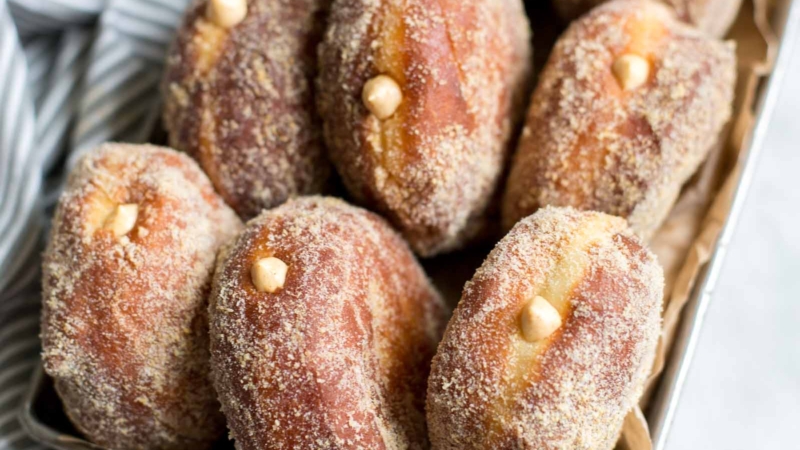 fried doughnuts filled with pumpkin cheesecake.