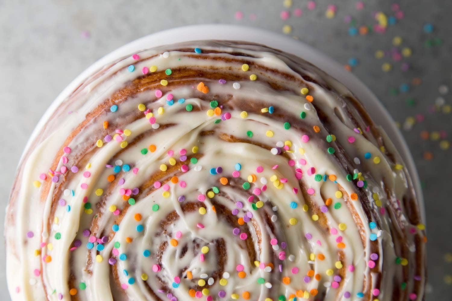 birthday cinnamon roll cake confetti cream cheese The Little Epicurean