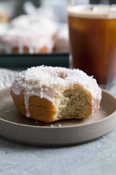 Coconut Cake Doughnut served on a small plate.