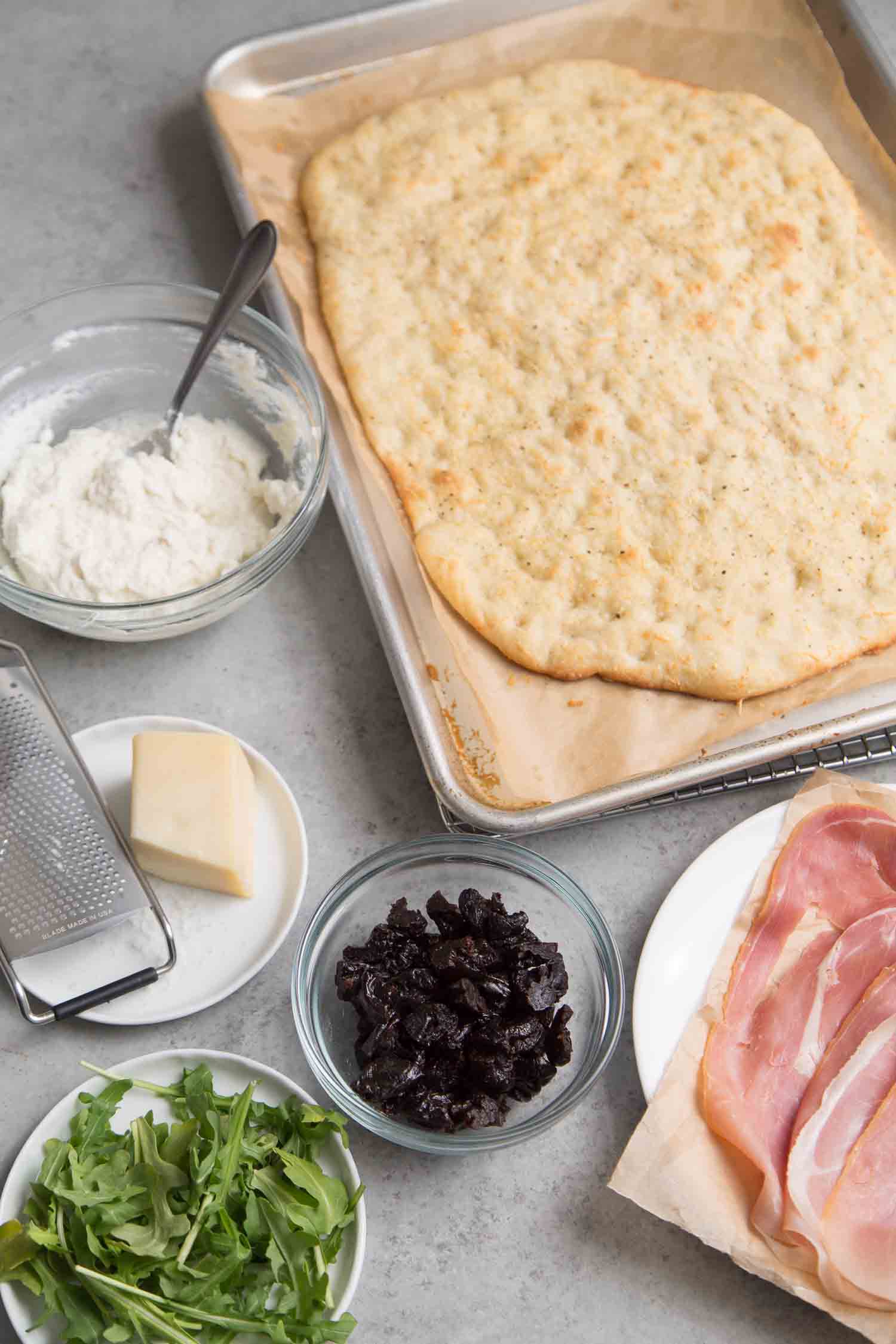 Ricotta Flatbread with Prunes and Jamon Serrano