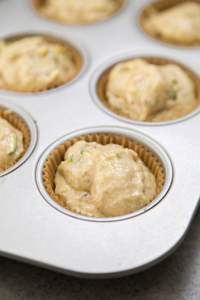 batter scooped into lined muffin tin.