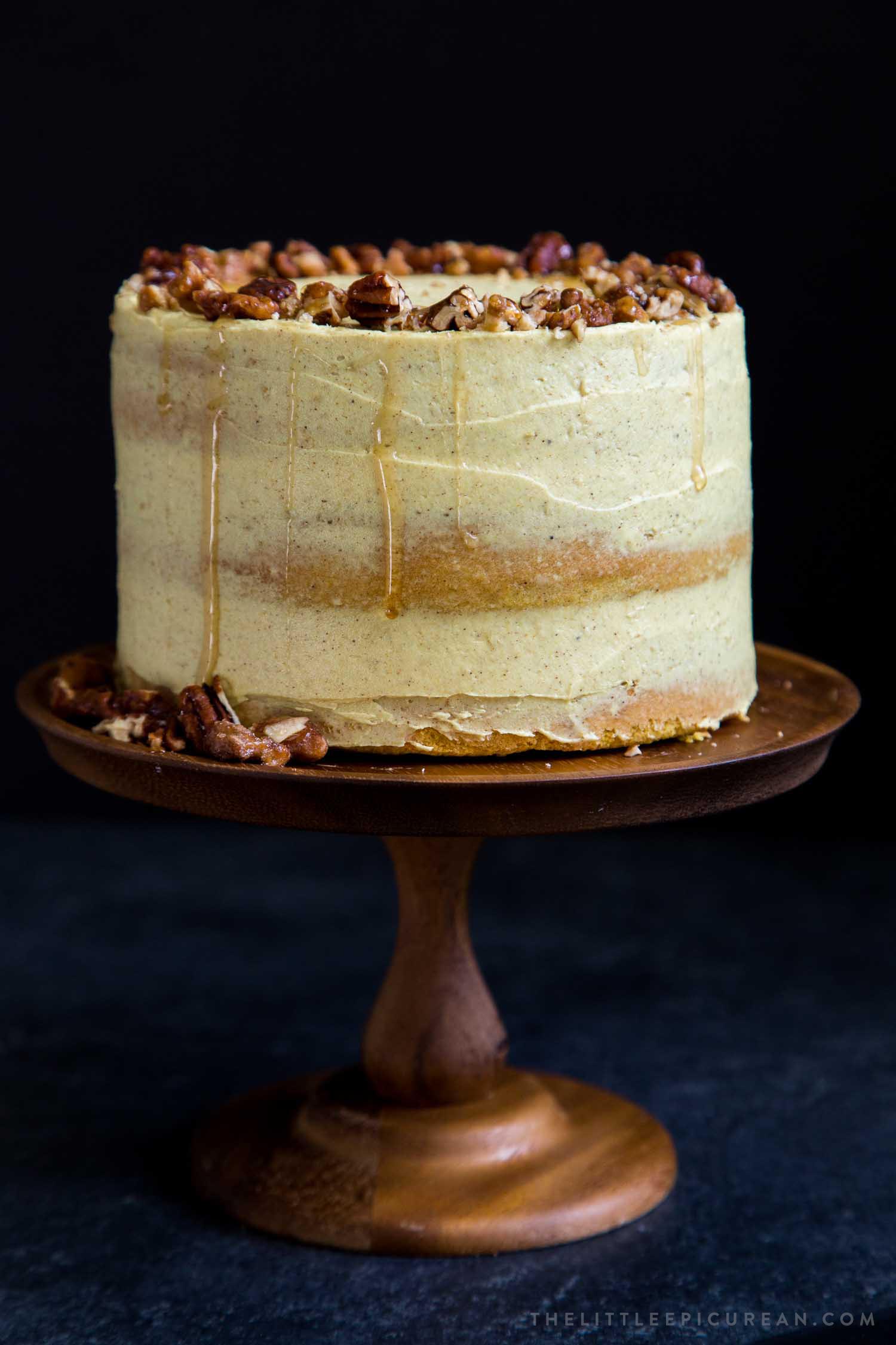 layer cake milk golden spices topped iconic chopped candied nuts translated warm sweet into