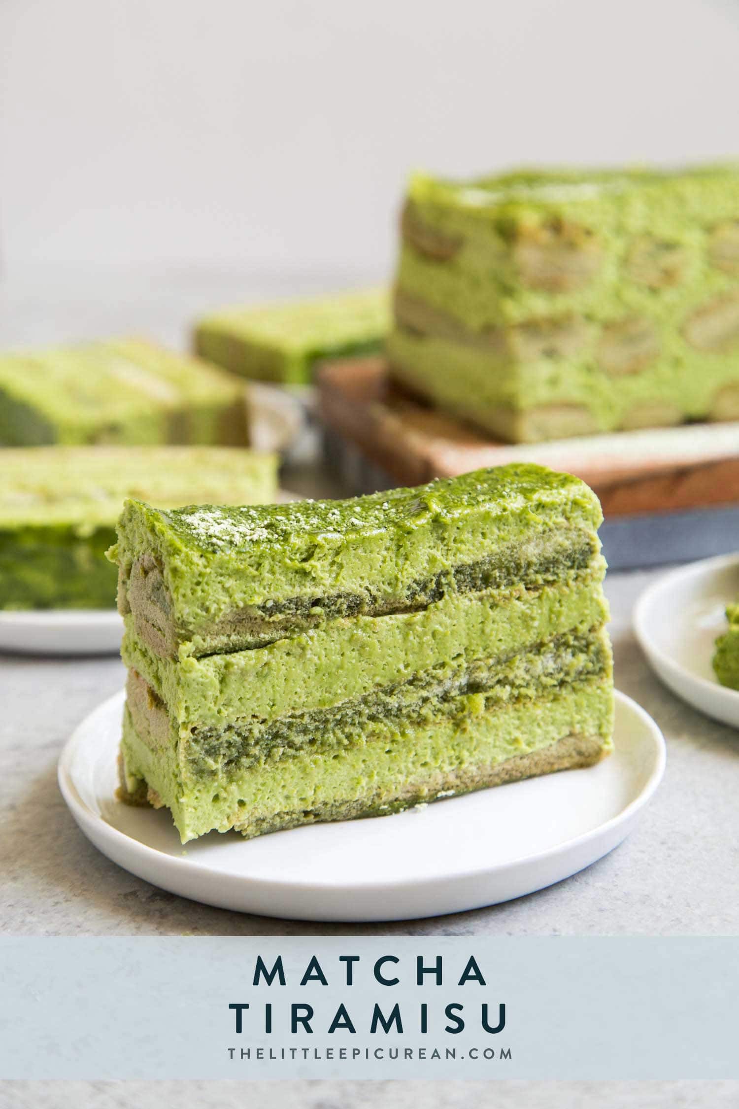 Matcha Tiramisu slice on white plate. 