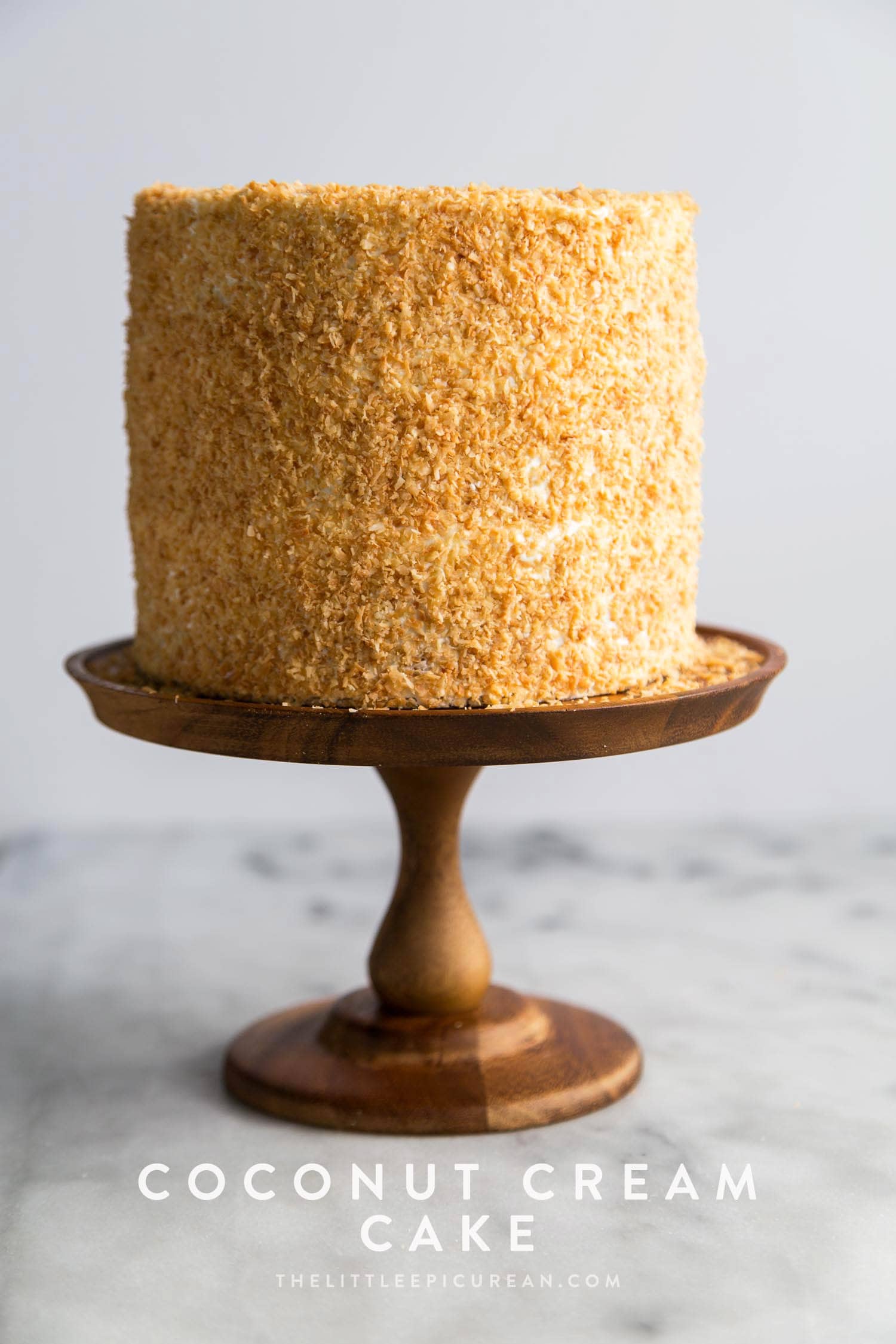 Coconut Cream Cake with toasted coconut