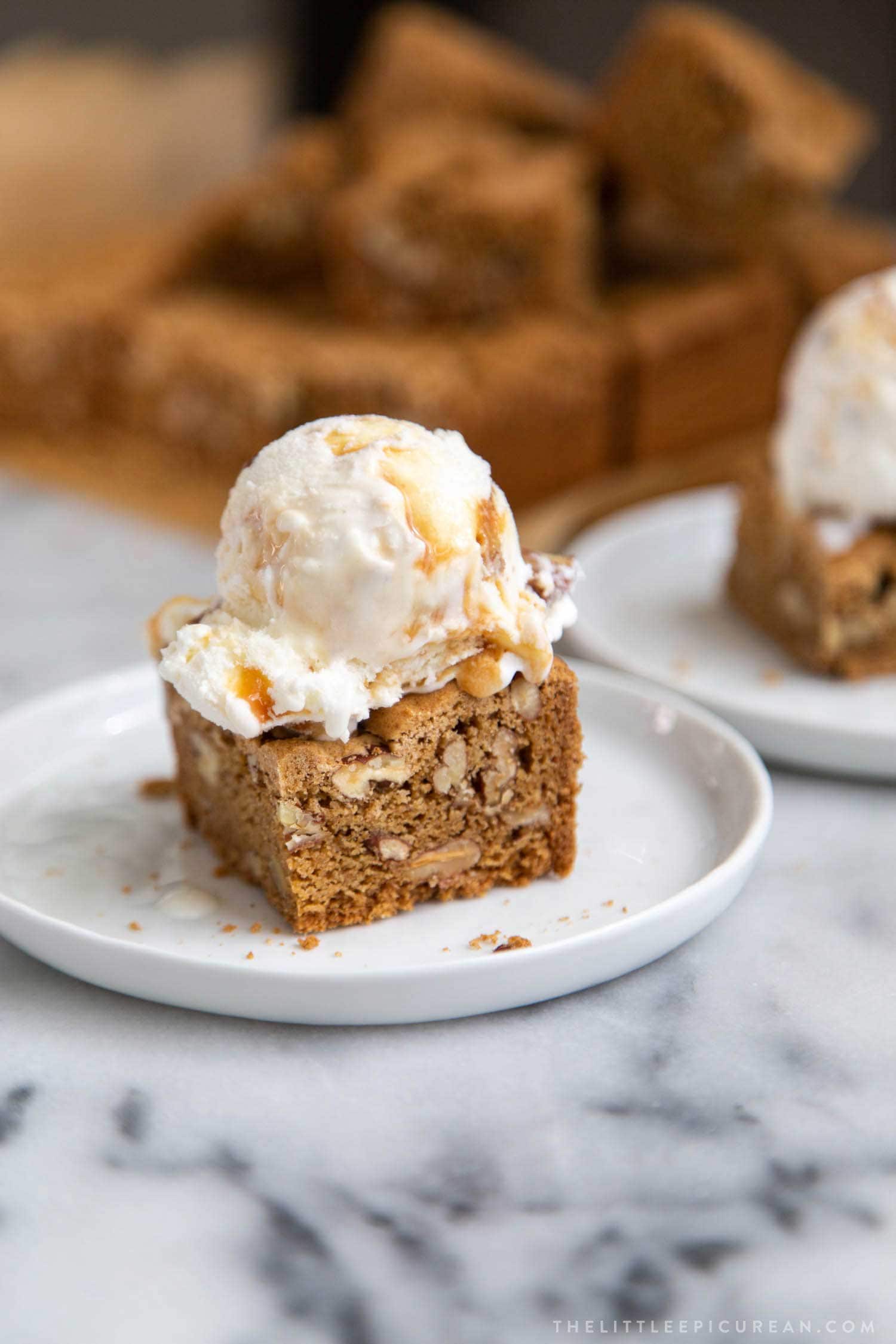Butter Pecan Blondies topped with butter pecan ice cream