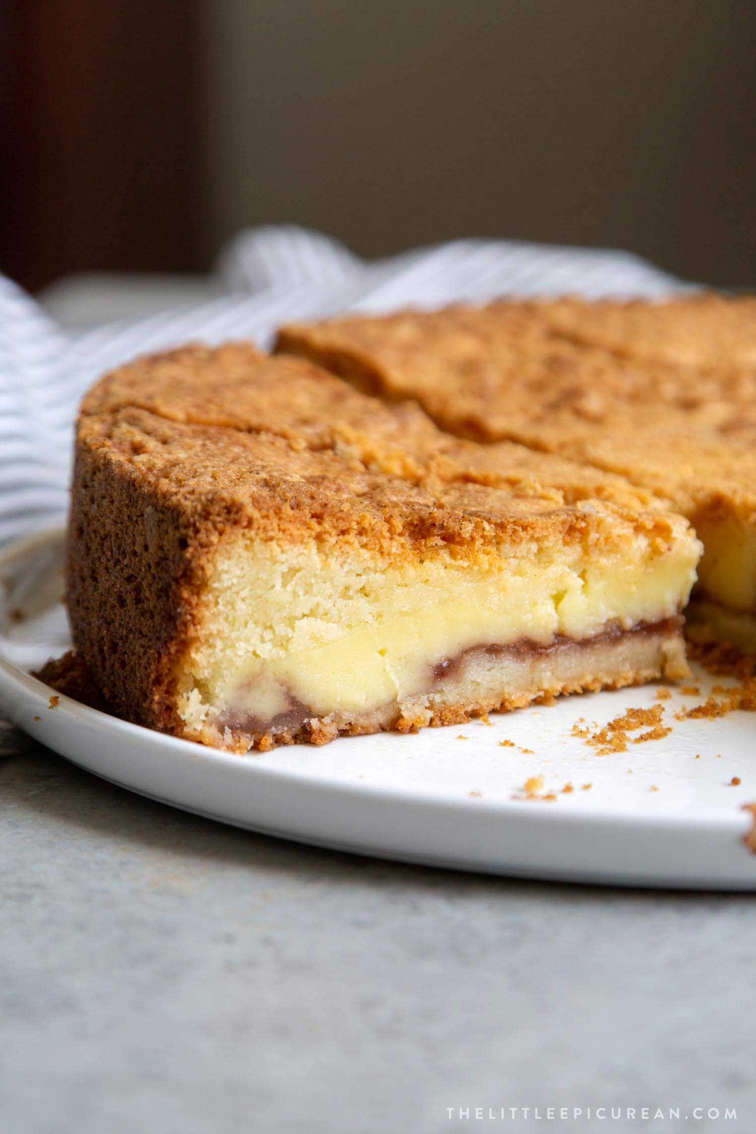 Basque Cake. Buttery cake with strawberry jam and pastry cream filling.