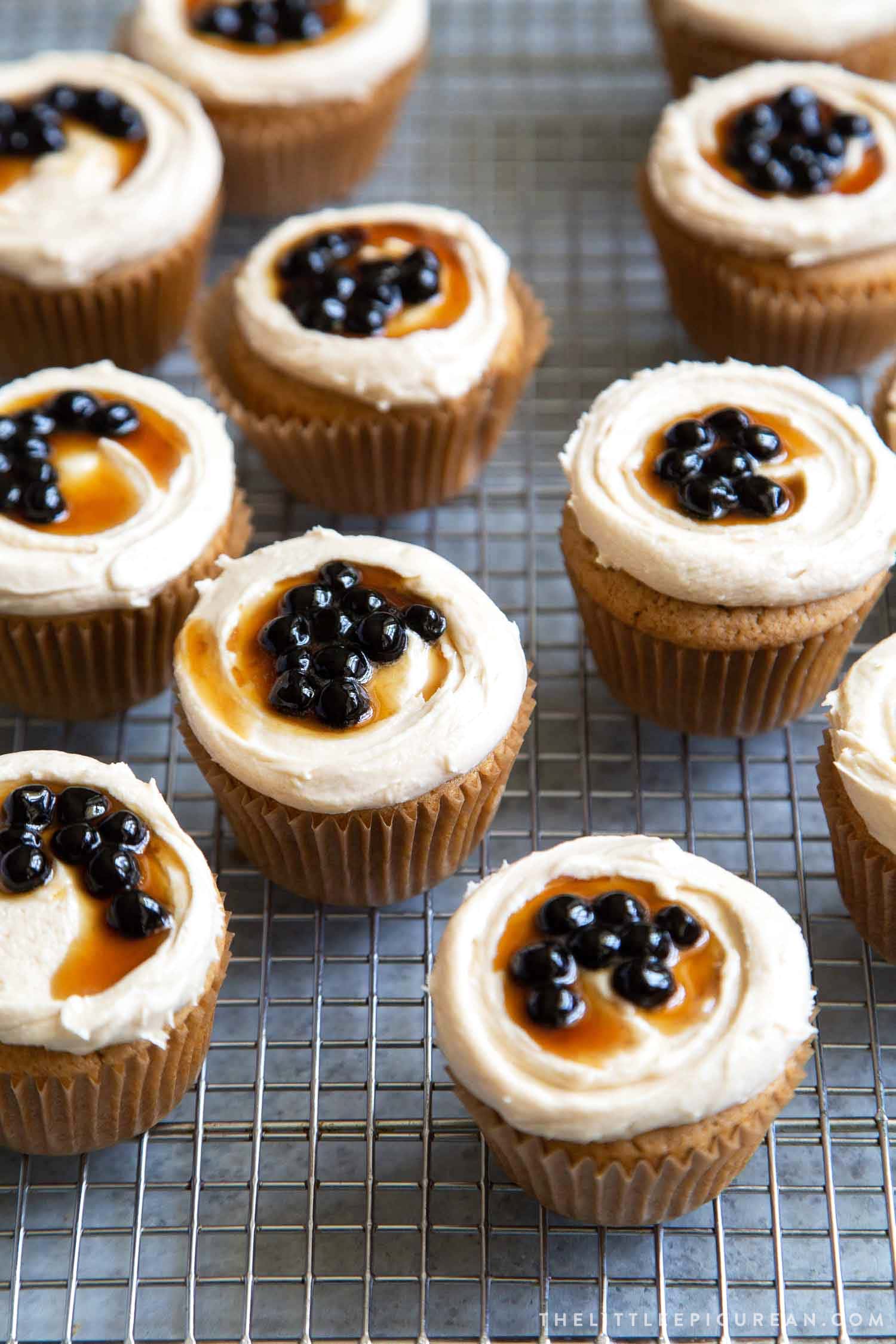 Boba Tea Cupcakes. Milk tea cupcakes filled with brown sugar boba and frosted with milk tea buttercream.