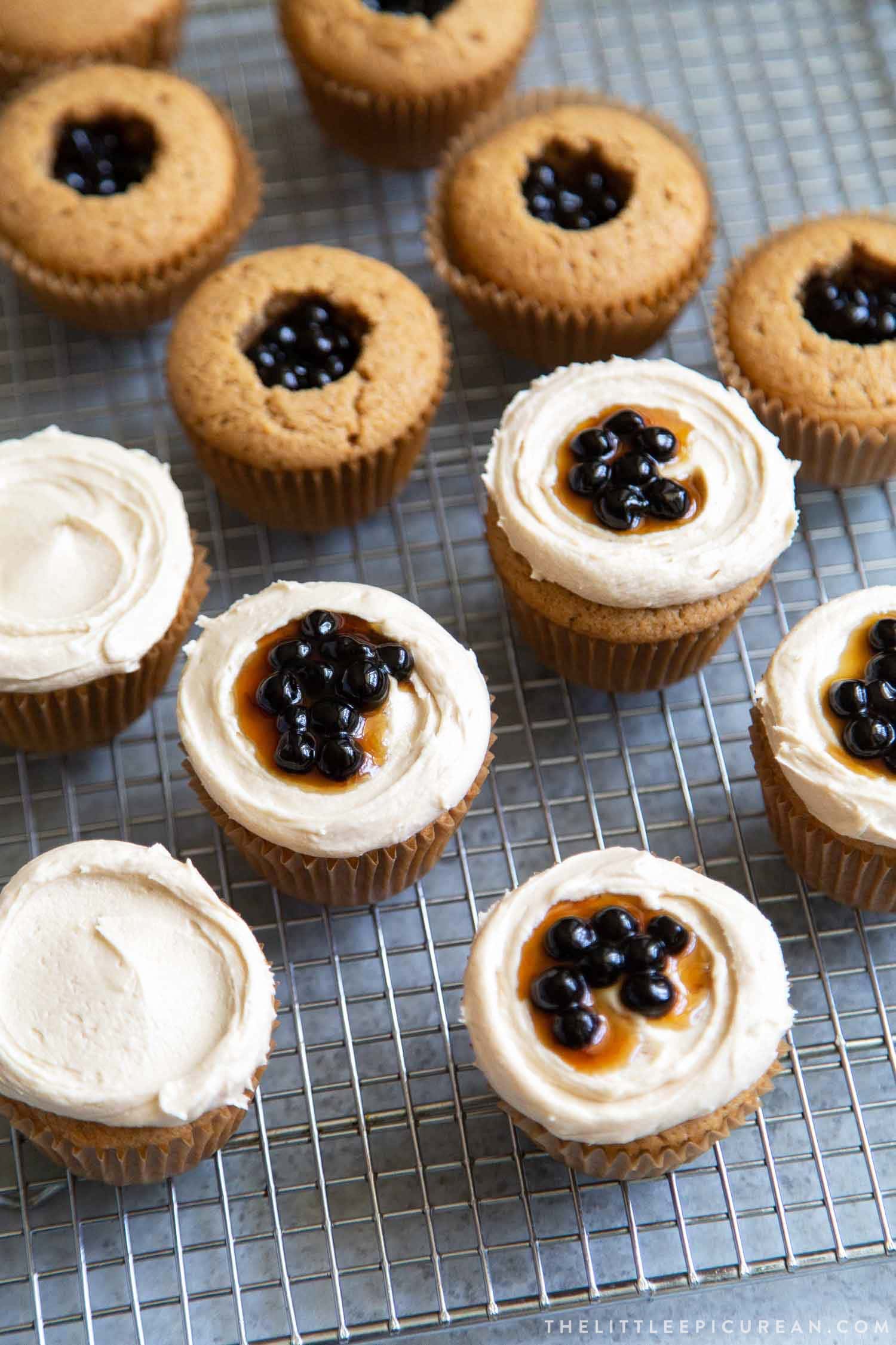 Boba Tea Cupcakes. Milk tea cupcakes filled with brown sugar boba and frosted with milk tea buttercream.