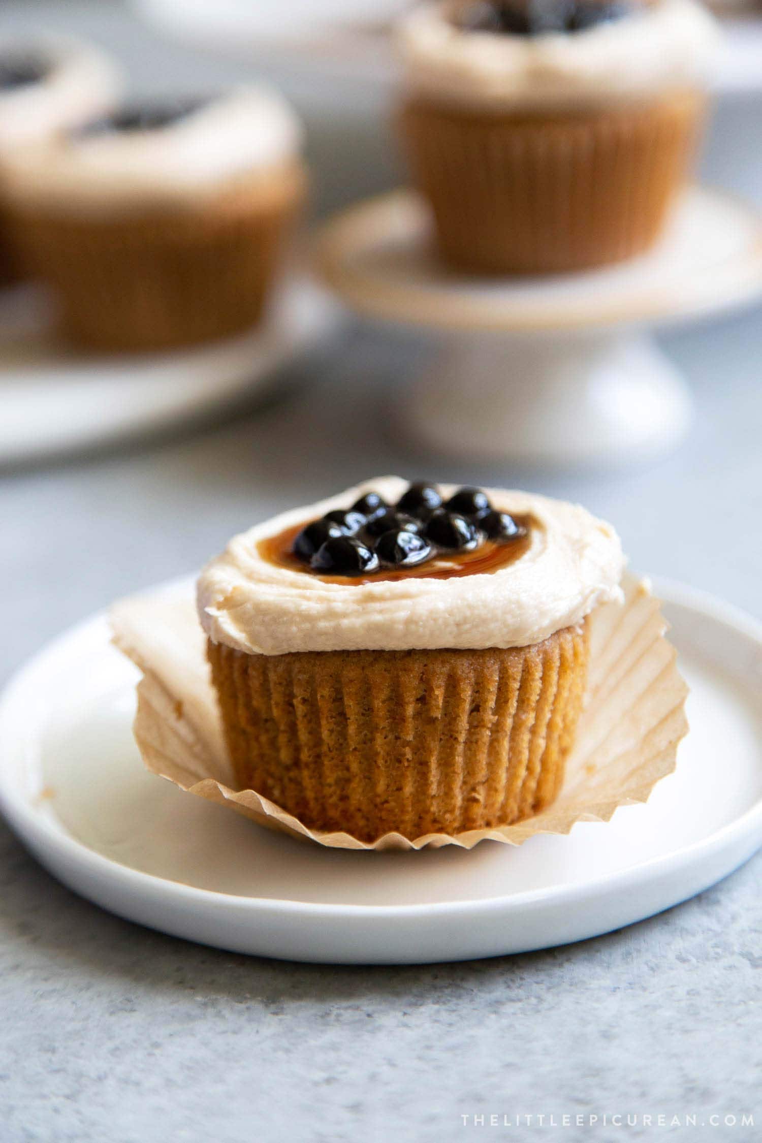 Boba Tea Cupcakes. Milk tea cupcakes filled with brown sugar boba and frosted with milk tea buttercream.