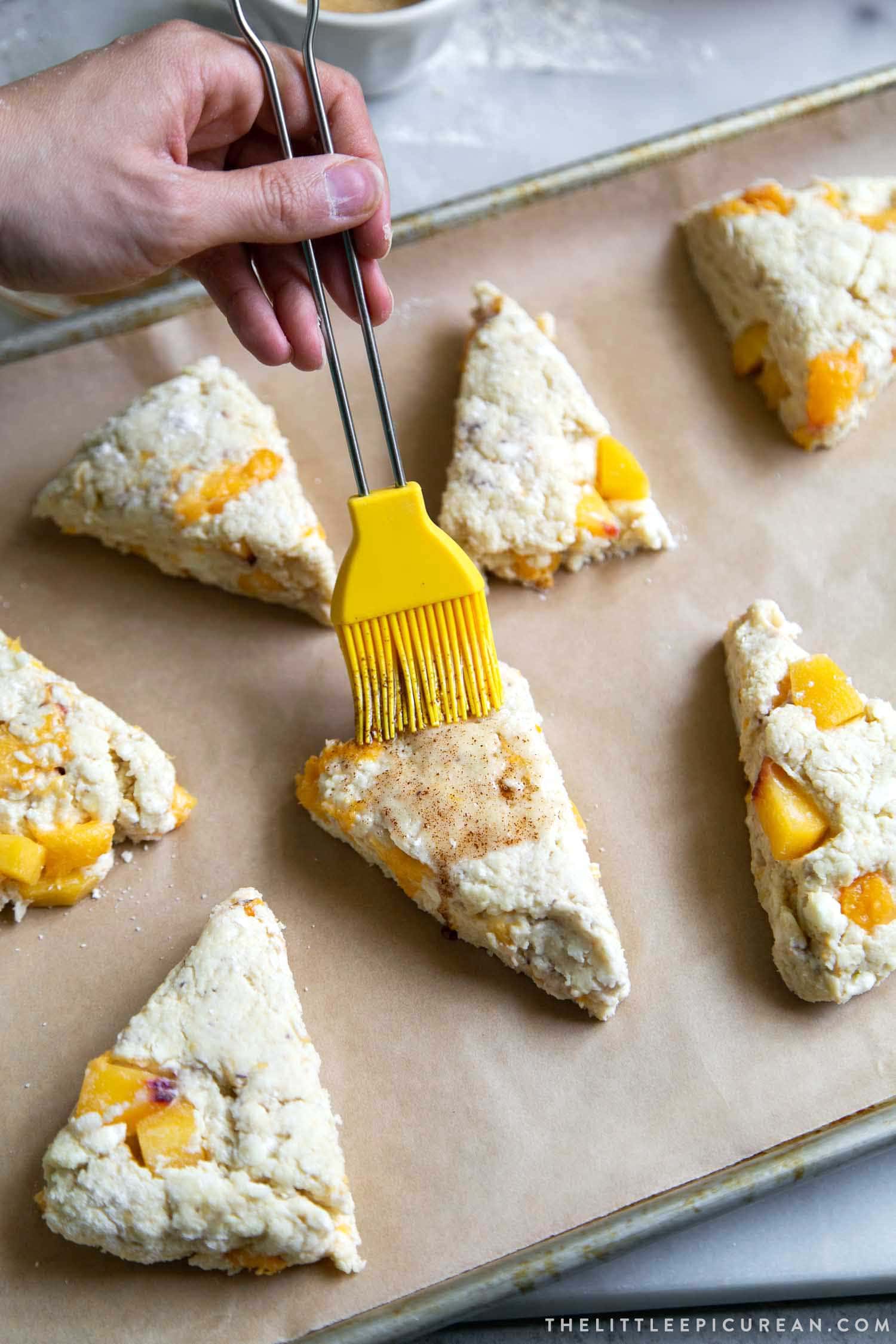 Brown Butter Peach Scones. Scone dough brushed with melted brown butter.