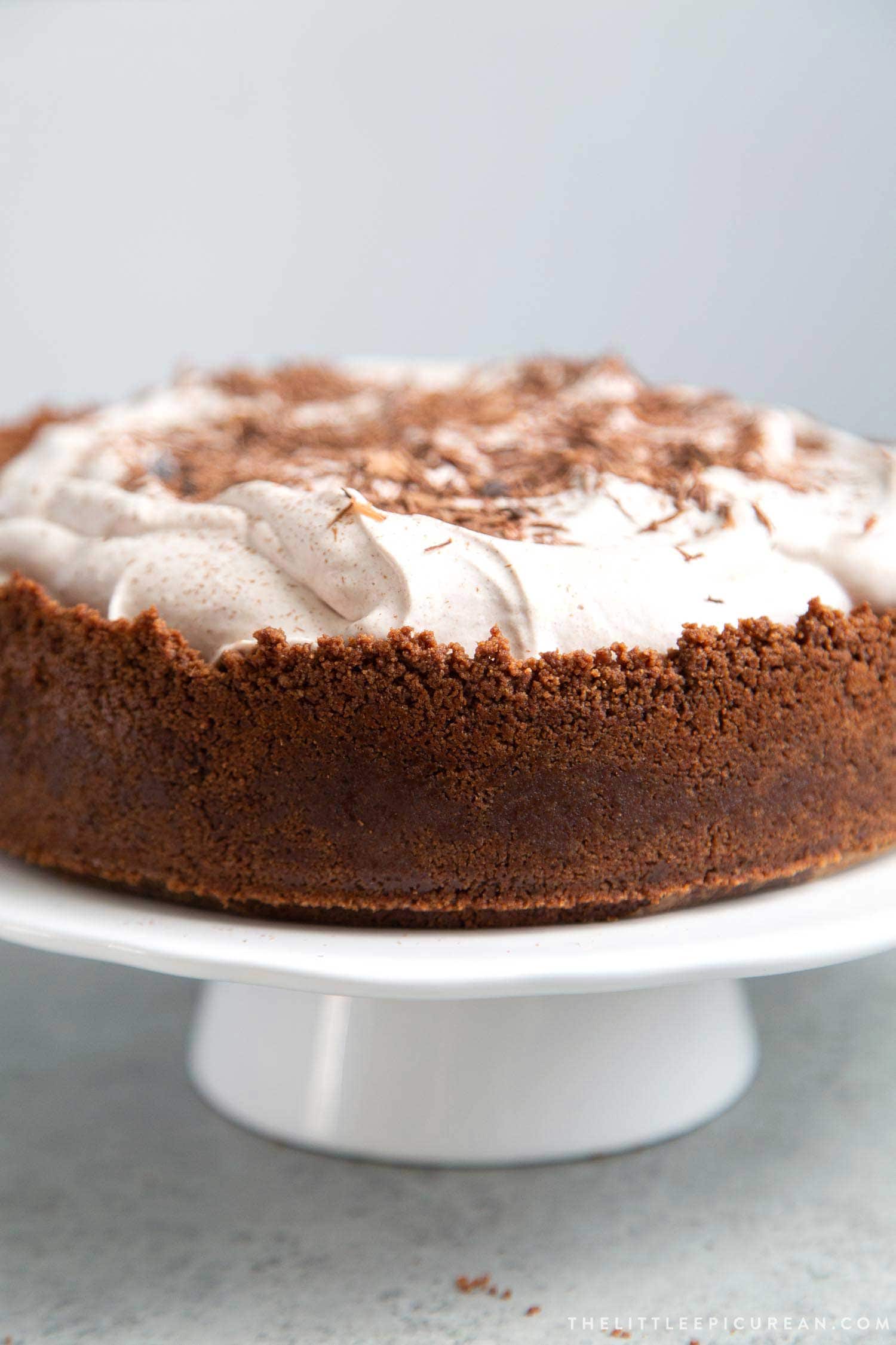 Chocolate Mousse Pie. Chocolate graham cracker crust filled with chocolate mousse and topped with whipped cream and chocolate shavings.