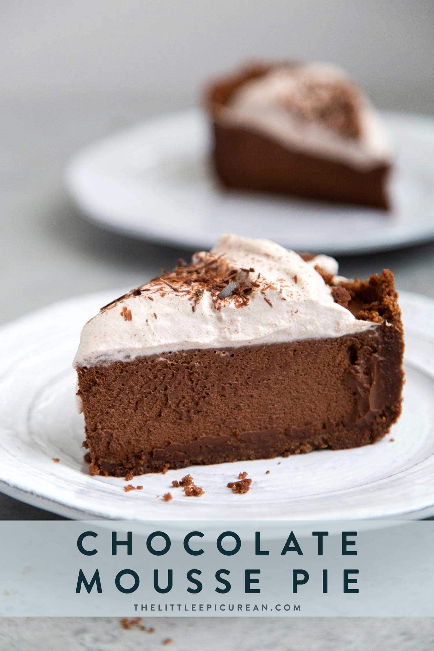 Chocolate Mousse Pie. Chocolate graham cracker crust filled with chocolate mousse and topped with whipped cream and chocolate shavings.