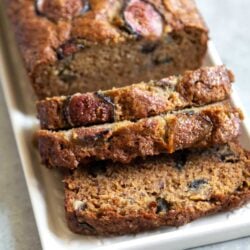 Brown sugar banana bread mixed with chopped figs in the batter and sliced figs on top to garnish.