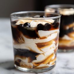 Taho. Layered sweet dessert consisting of silken tofu, arnibal, and tapioca balls