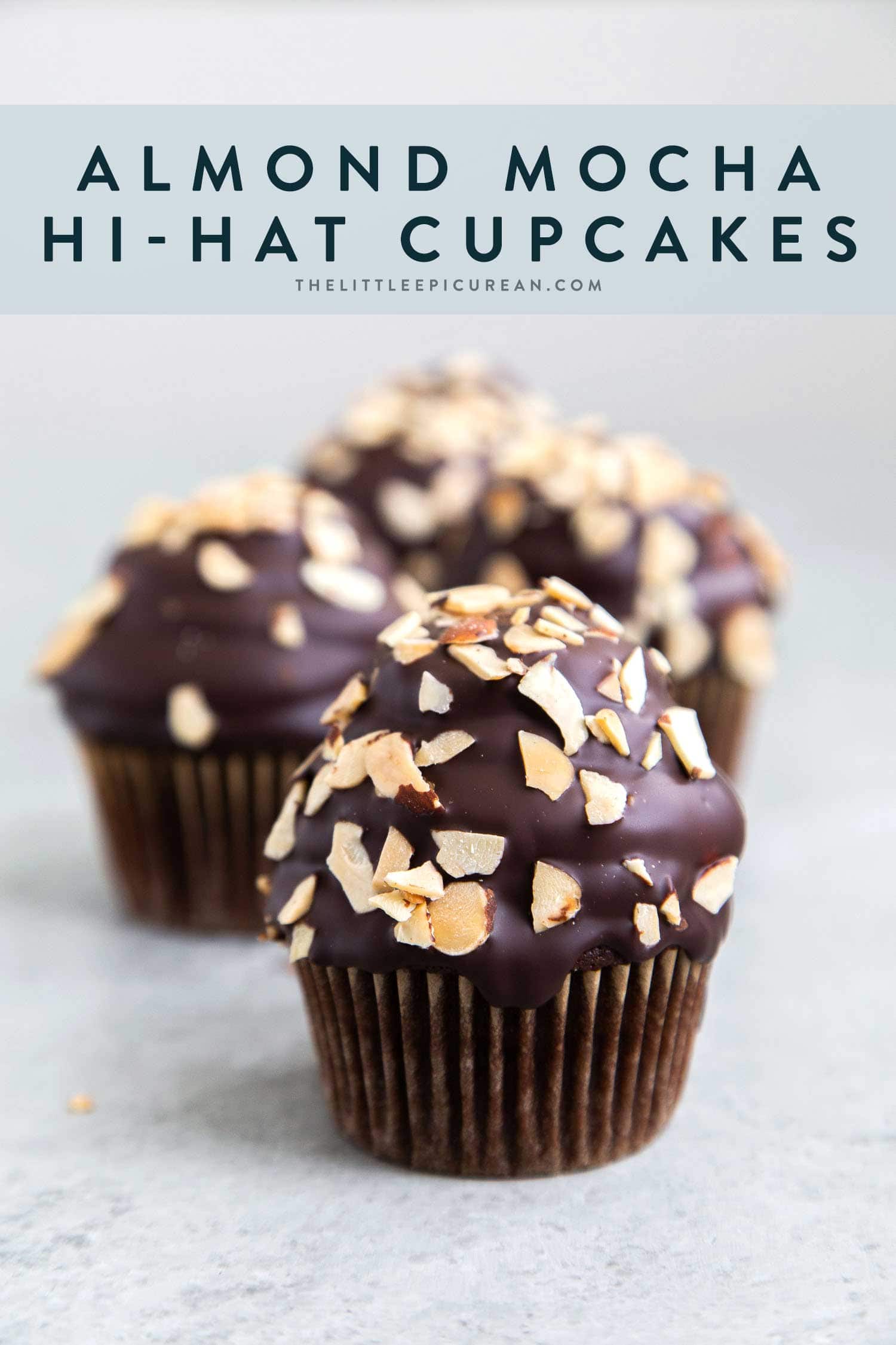 Almond Mocha Hi-Hat Cupcakes. Easy to make chocolate cupcakes topped with espresso meringue. It's dipped in chocolate and topped with toasted almonds.