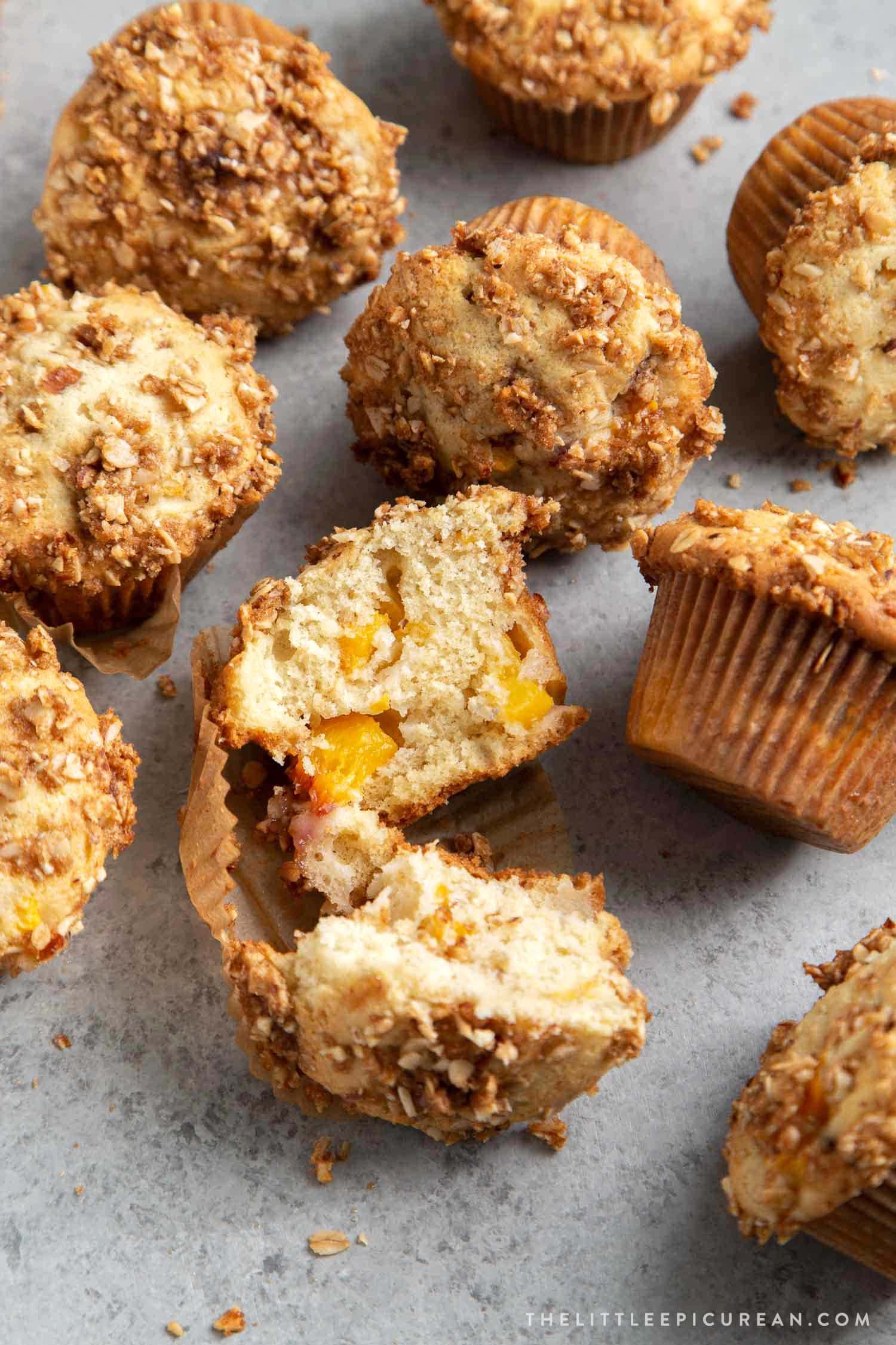 Almond Streusel Peach Muffins. Vanilla muffins mixed with fresh peaches and topped with almond streusel crumble.