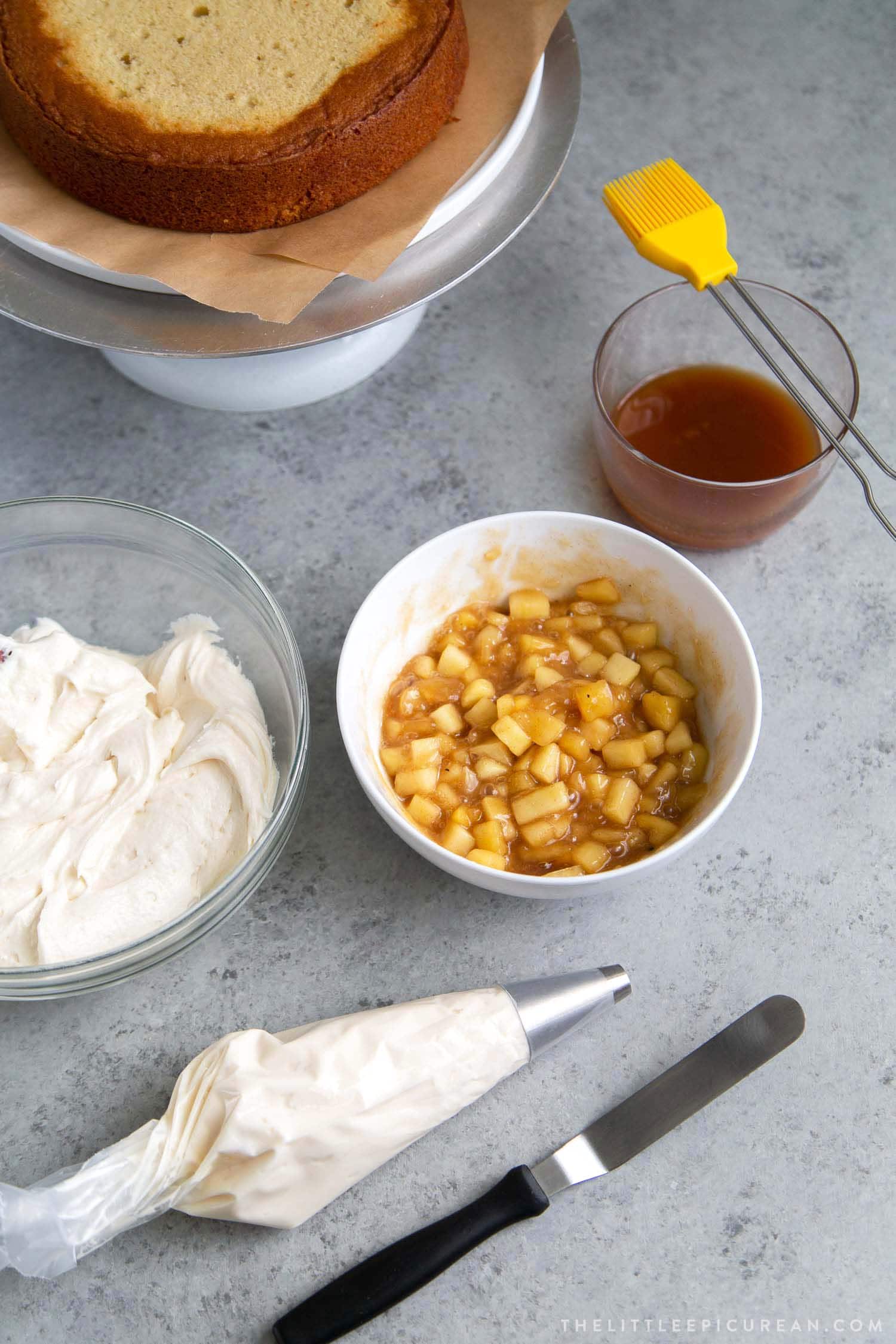 Apple Cider Layer Cake Ingredients: apple cider yellow cake, cooked apple filling, apple cider buttercream, apple cider soaking liquid