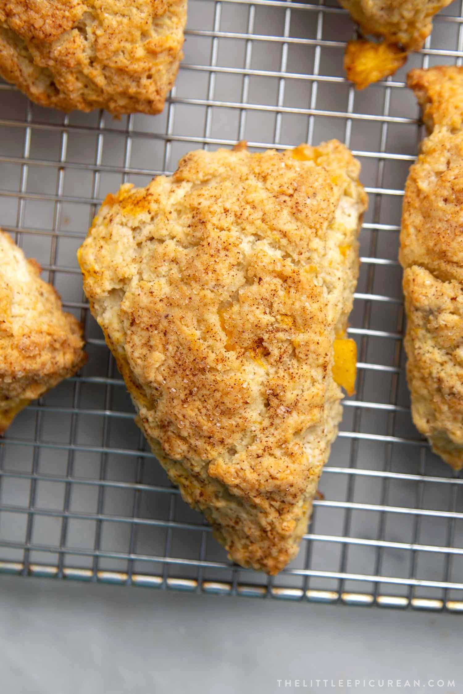 Brown Butter Peach Scones. These easy to make summer scones are made with fresh peach chunks and brushed with nutty brown butter. 
