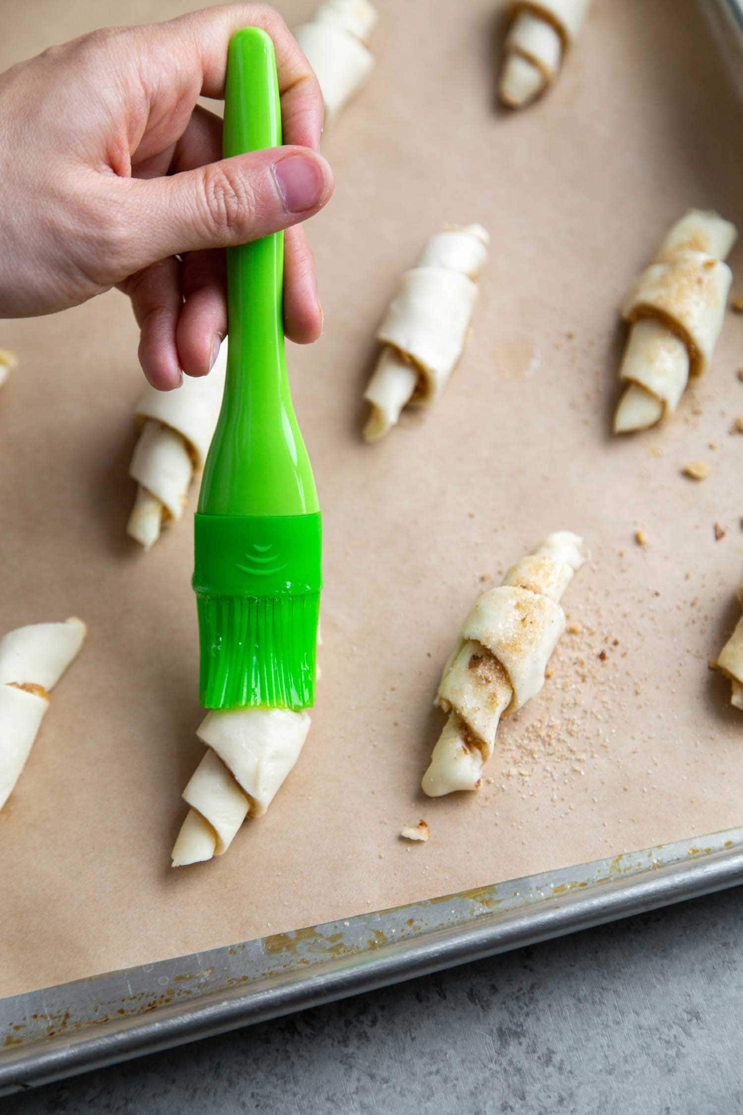 Brush guava rugelach with egg whites and top with cinnamon sugar before baking