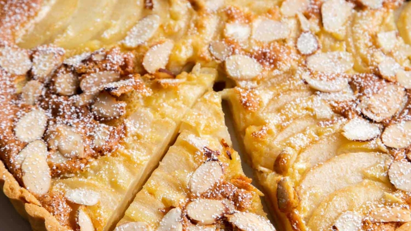 Pear Frangipane Tart. Buttery shortbread crust baked with almond frangipane filling and sliced pears.