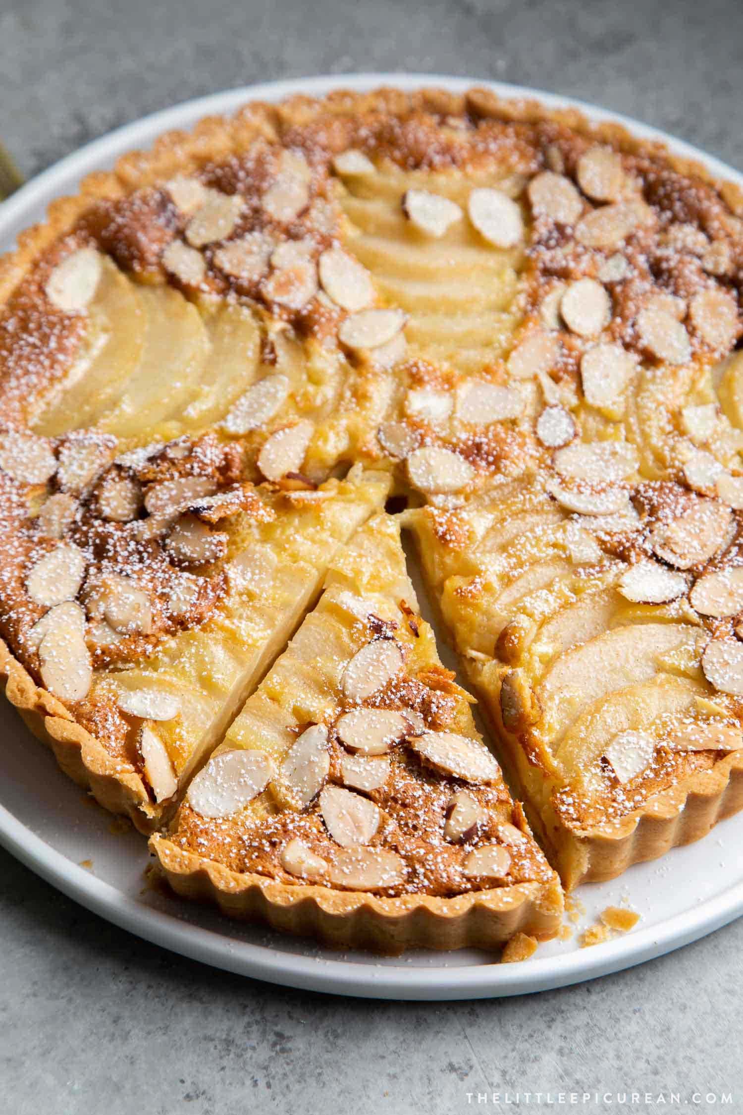 Pear Frangipane Tart. Buttery shortbread crust baked with almond frangipane filling and sliced pears.