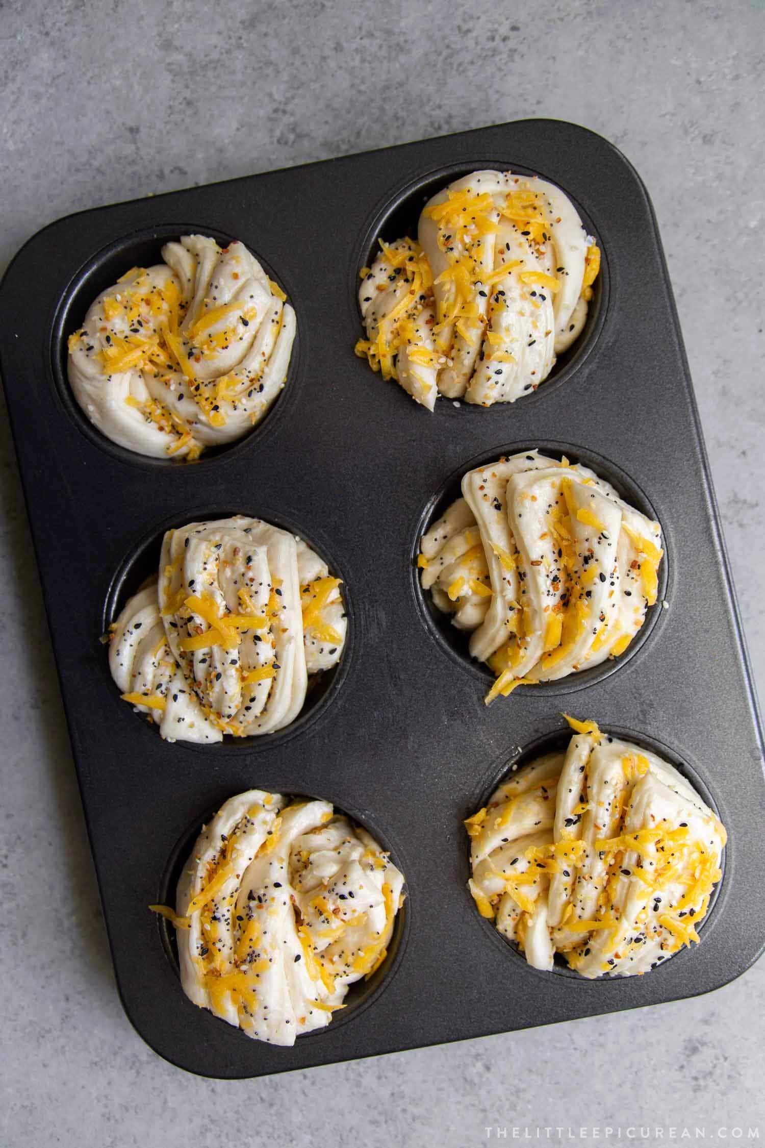 Cheddar Everything Babka Buns ready for the oven.