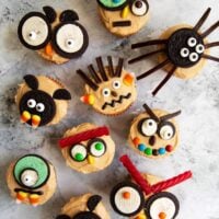 Easy to decorate Halloween cupcakes using a variety of store-bought cookies and candies. Use your favorite cupcake recipe, or try the peanut butter cupcakes with peanut butter frosting in this post.