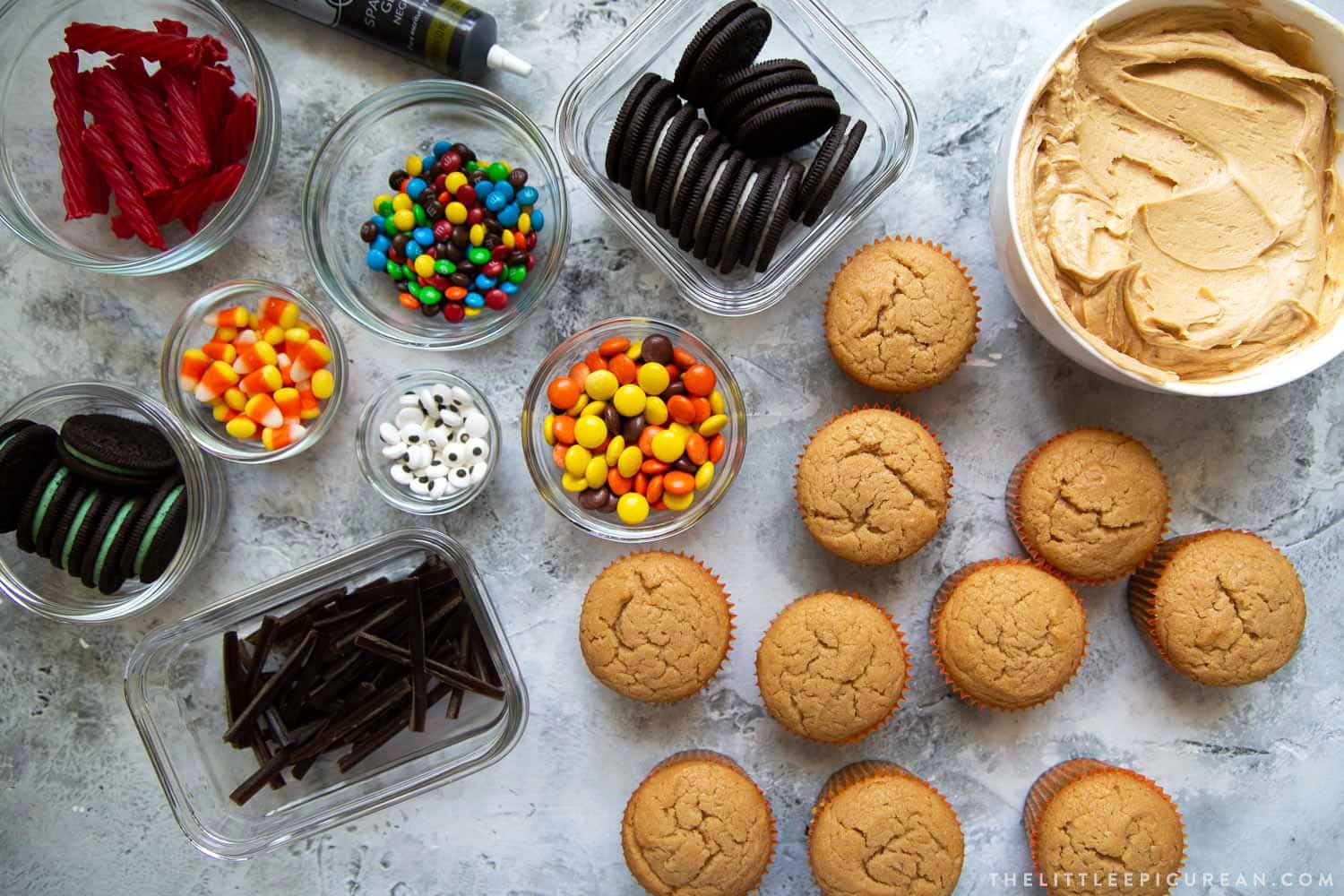 Easily decorate Halloween cupcakes with a handful of store-bought candies. This post teaches you how to make 10 different Halloween cupcake decorations!