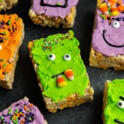 Monster Marshmallow Cereal Treats. Brown butter cereal treats frosted with buttercream and decorated with candies. It's a fun project to do with kids this Halloween!