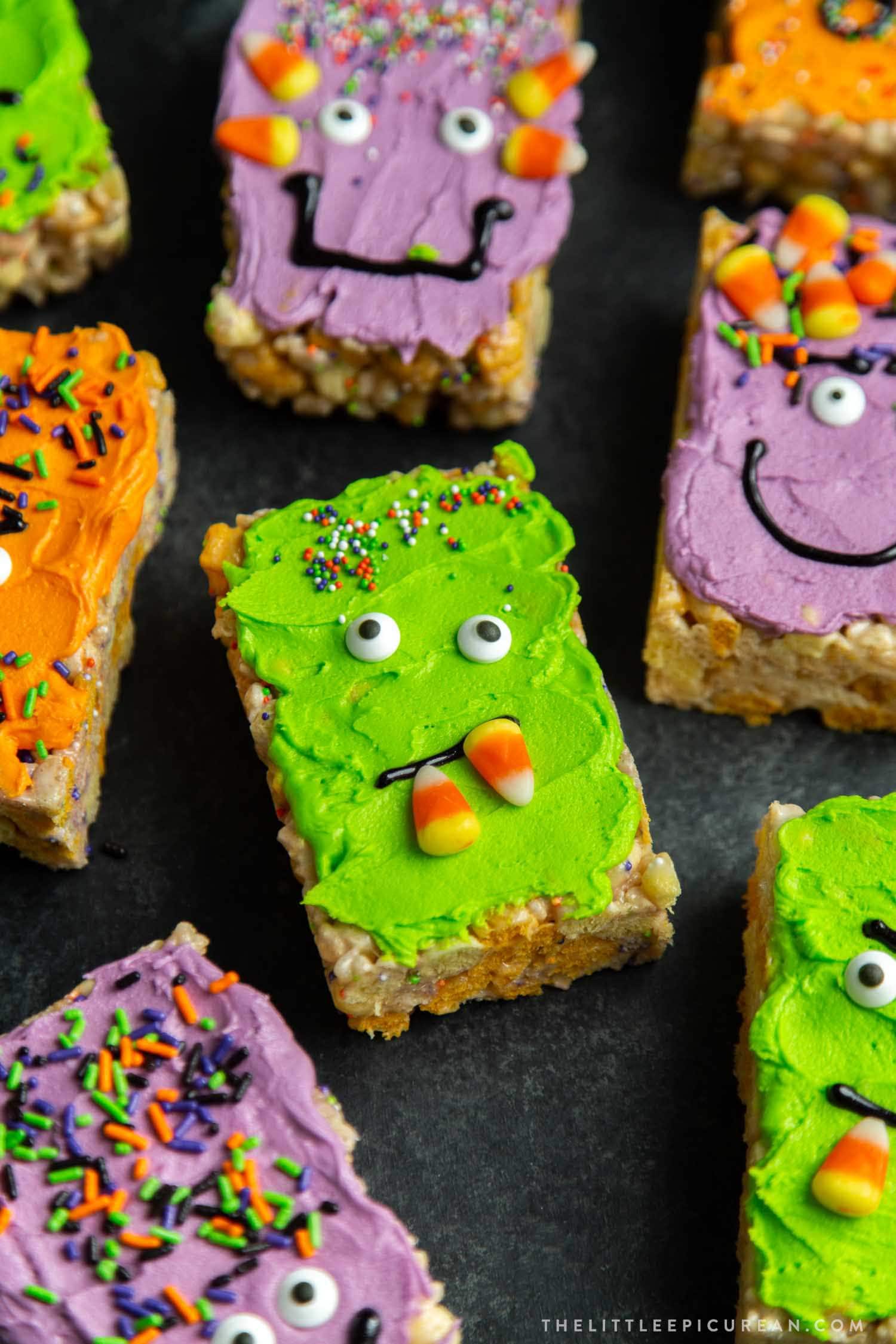 Monster Marshmallow Cereal Treats. Brown butter cereal treats frosted with buttercream and decorated with candies. It's a fun project to do with kids this Halloween!