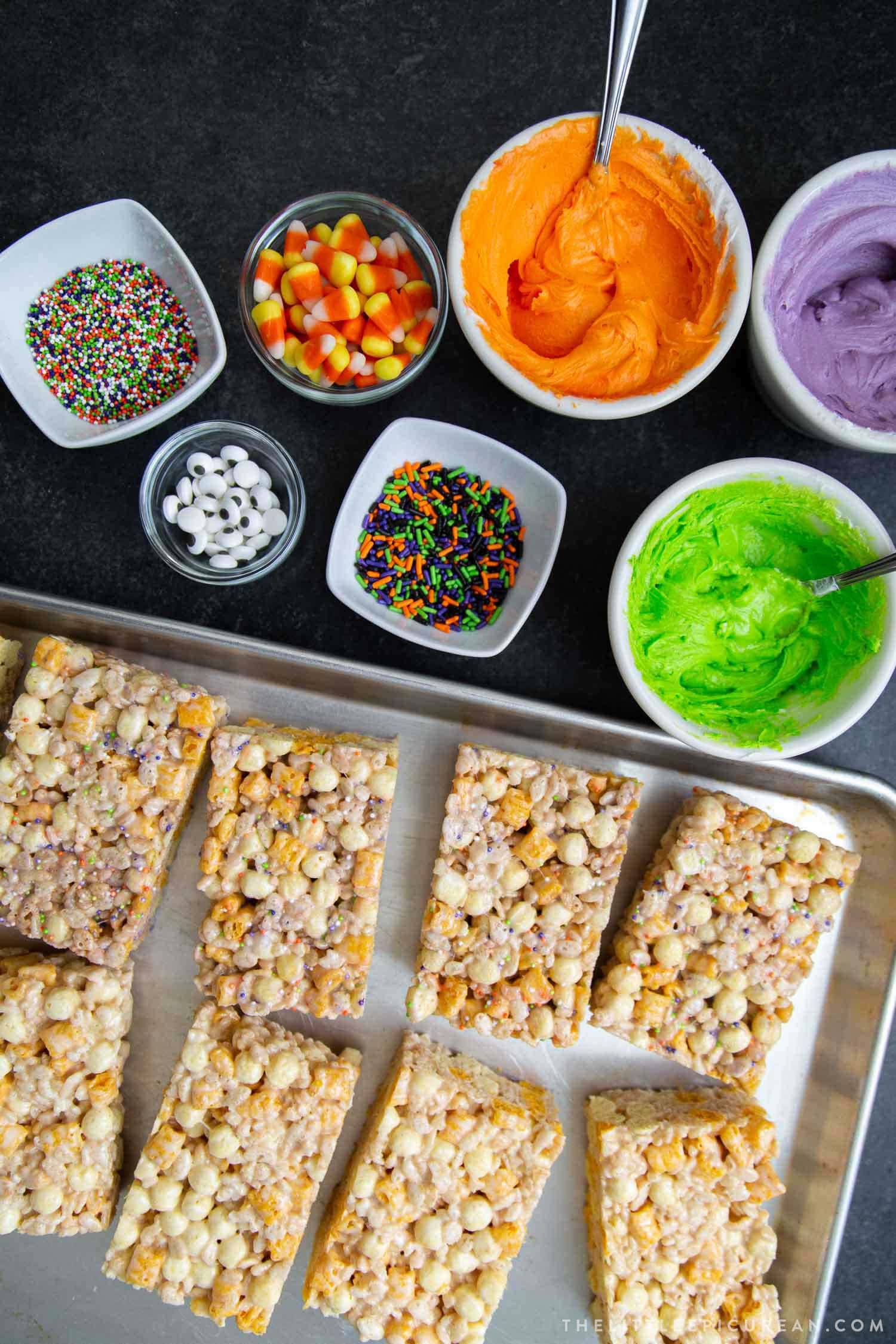 Monster Marshmallow Cereal Treats. Brown butter cereal treats frosted with buttercream and decorated with candies. It's a fun project to do with kids this Halloween!