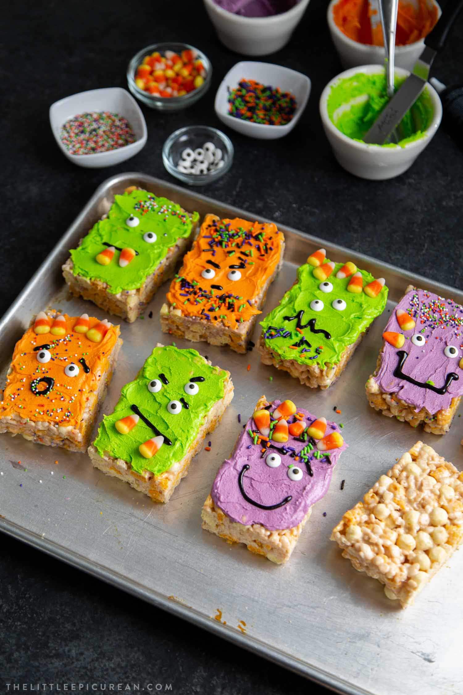 Monster Marshmallow Cereal Treats. Brown butter cereal treats frosted with buttercream and decorated with candies. It's a fun project to do with kids this Halloween!