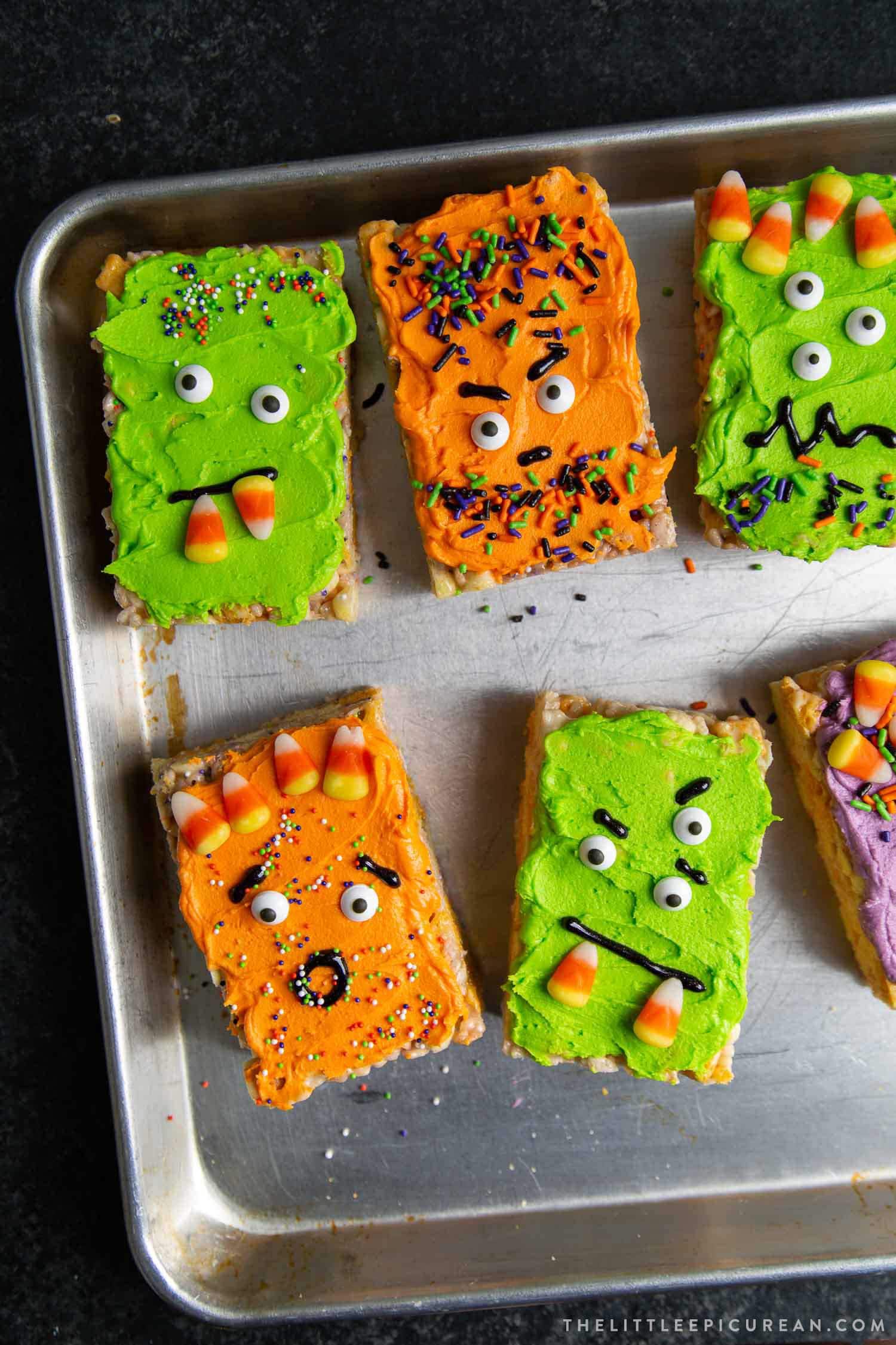 Monster Marshmallow Cereal Treats. Brown butter cereal treats frosted with buttercream and decorated with candies. It's a fun project to do with kids this Halloween!
