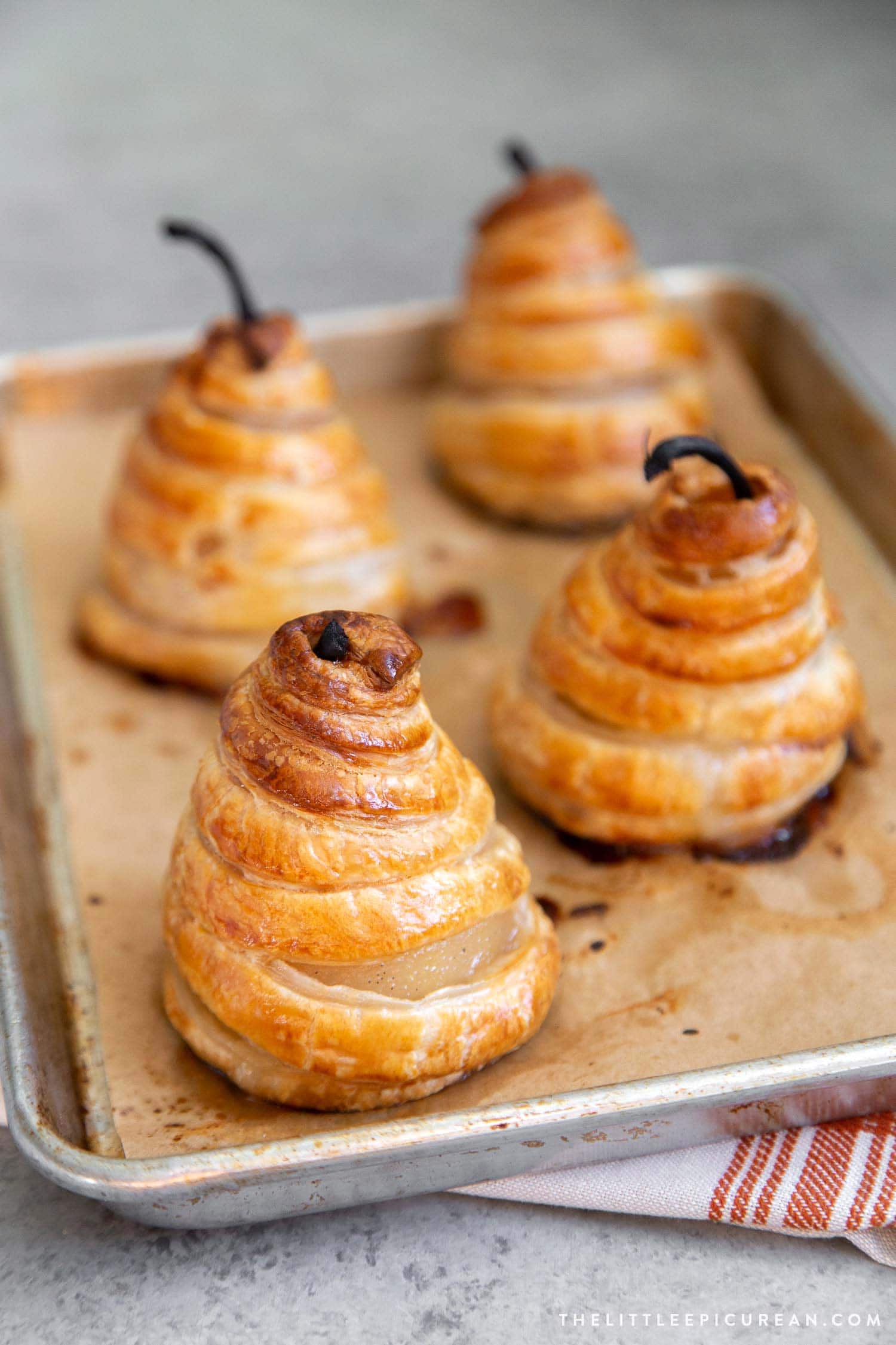 Poached pears baked in puff pastry. 