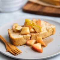 Spiced Apple Pound Cake. Orange scented pound cake topped with cooked spiced apples. #dessert #poundcake #recipe #appledessert